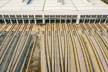Fototapeta premium Aerial shot of a bustling cityscape featuring multiple railroads and train tracks