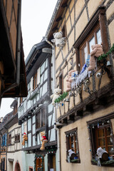 Charming Street with Old Houses in Beautiful village Eguisheim, in christmas time, Alsace, France