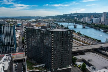 Obraz premium Aerial view of Portland East Side of the Willamette River Downtown on a sunny day