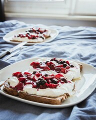 Vertical closeup of a sandwich with yogurt and berry jam on a plate