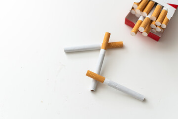 Smoking cigarettes with filter isolated on white