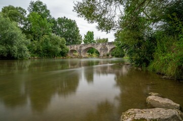 Beautiful arched stone bridge over the Pfunz Stream in Germany