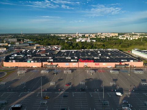 Poland, Bialystok August 3, 2023.  Auchan shopping center before opening, drone view.
