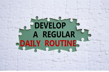 Daily routine symbol. Concept words Develop a regular daily routine on white puzzle. Beautiful grey green background. Business and Develop a regular daily routine concept. Copy space.
