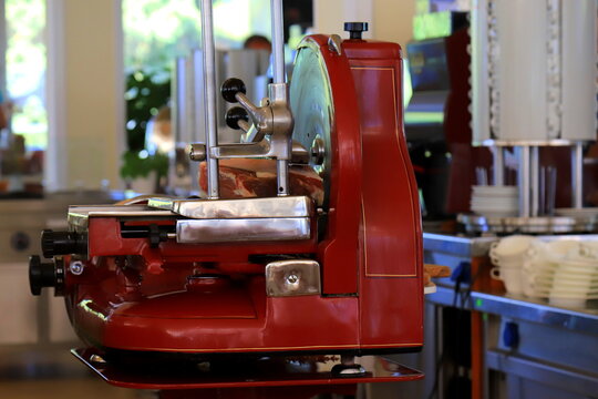 Red meat cutter, slicer in the kitchen, slicing machine