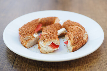 Turkish Bagel Simit and cheese on table 