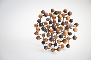 Molecular structure of wood and metal for teaching the different chemical elements.
