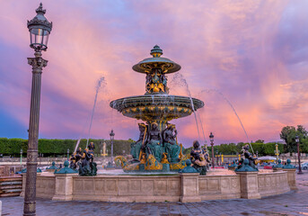 Fountain in Place de la Concorde in Paris at sunset