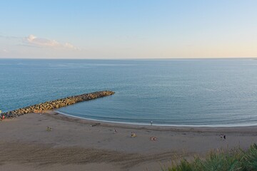 Playa del Ingles beach at sunset in Maspalomas, Gran Canaria, Spain