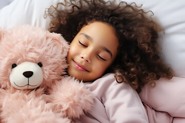 Girl child African American woman sleeping in bed in the morning with pink bear