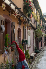 Kayserberg village at Christmas time in winter with Christmas decorations on the houses, Alsace, France.