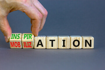 Inspiration or mobilization symbol. Concept words Inspiration and Mobilization on wooden cubes....