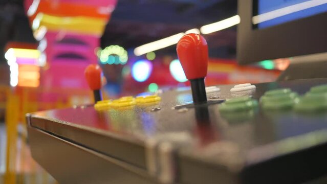 closeup of button on games machine.