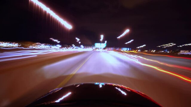 night highway driving timelapse footage with overhead lights 