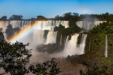 Fototapeta premium Iguazu Falls at Isla San Martin, one of the new seven natural wonders of the world in all its beauty viewed from the Argentinian side - traveling and exploring South America 