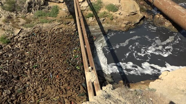 Discharge of sewage into the environment with large pipes