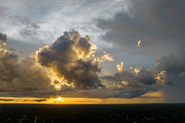 Cumulonimbus clouds forming before thunderstorm on evening sky. Changing stormy cloudscape weather...