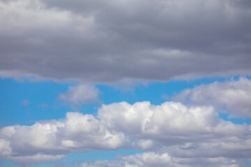 Clouds with exotic elongated shape on blue sky background