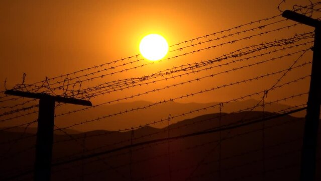 Barbed wire and border fence