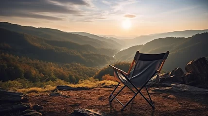 Cercles muraux Camping foldable camping chair set against a stunning mountain backdrop in the morning