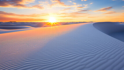 As the sun sets on the horizon, it casts a golden glow over the white sands