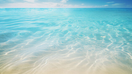 Fototapeta na wymiar Crystal clear turquoise seawater gently laps against the white sand
