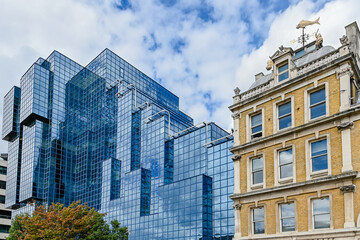 London, UK, 13 August 2023: Modern London City skyline and 
victorian building along River Thames
