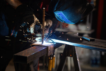 man welder, mig or tig welding, craftsman, erecting technical steel Industrial,  steel welder in...