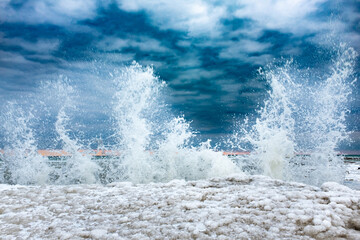 Water splashing up on shore on Lake Ontario Canada