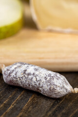 small salami sausages with white mold, dry food meat