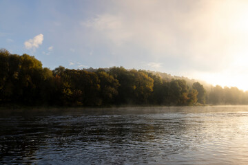 A little fog on the river in autumn