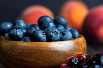 A fresh cake made of buttercream and blueberries