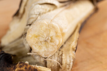 still an edible banana whose peel is covered with black spots