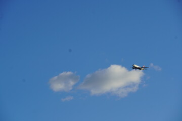 blue sky white cloud with air plane