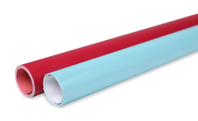Rolls of colorful wrapping papers on white background