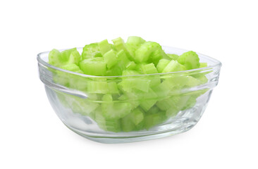 Glass bowl of fresh cut celery isolated on white