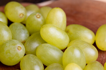 Green yellow grapes grown in a home vineyard