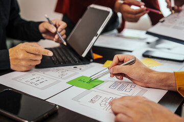 UI, UX designers developers Group team meeting often fill variety of roles in prototyping, product development and adds new ideas to mix, helps set stage for better collaboration during build phase.