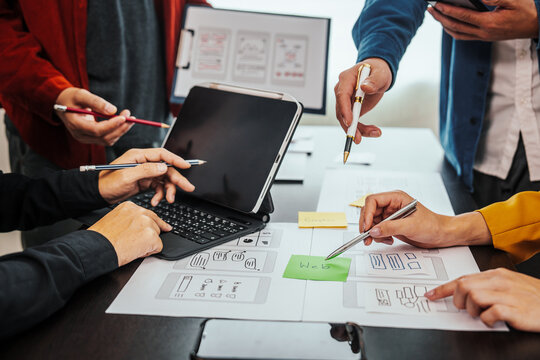 UI, UX designers developers Group team meeting often fill variety of roles in prototyping, product development and adds new ideas to mix, helps set stage for better collaboration during build phase.