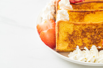 french toast with fresh strawberry and whipping cream