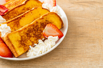 french toast with fresh strawberry and whipping cream