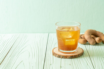 Delicious sweet drink tamarind juice and ice cube