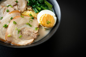 Ramen noodles in pork bone soup with roast pork and egg
