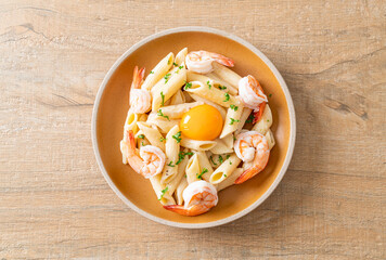 penne pasta white cream sauce with shrimps and egg