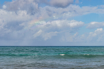Arcoíris en día soleado en la Playa Macao - Punta Cana, República Dominicana