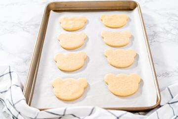 Panda shaped shortbread cookies with chocolate icing