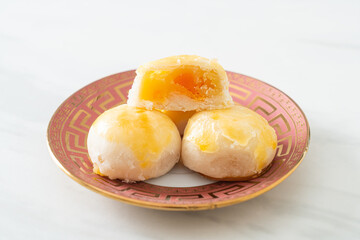 Chinese pastry moon cake with salted egg peanut or Spring Roll pastry with nuts and salted eggs