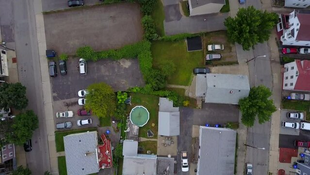 Aerial Top View Shot Of Street Amidst Houses In City, Drone Flying Over Residential District - Boston, Massachusetts