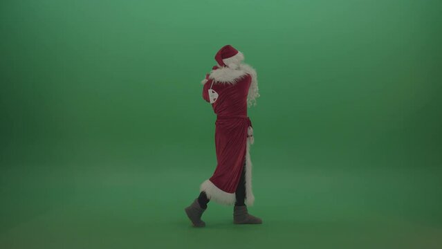 Funny santa scores 10 points playing golf over chromakey background