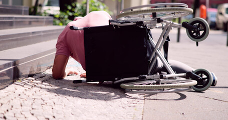 Wheelchair Fall Accident. Sad Man